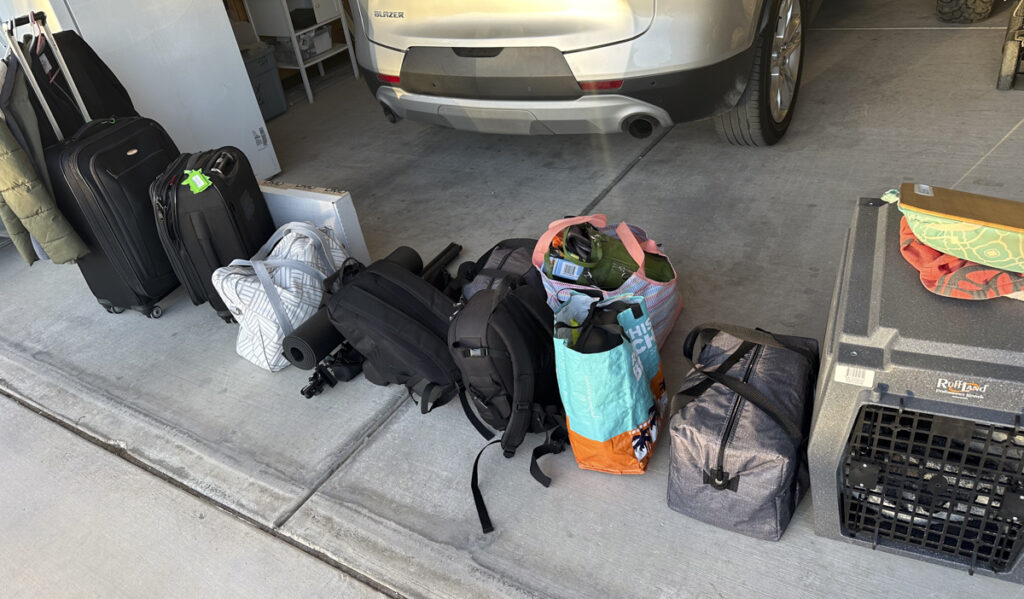 Personal belongings all lined up in a row. 